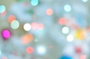 A dreamy bokeh background with colorful blurred lights creating a serene atmosphere.